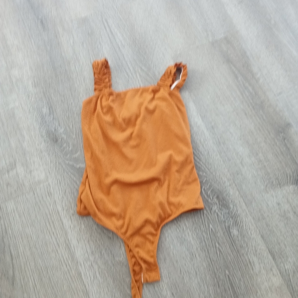 2 saints body suit - Picture 2 of 9